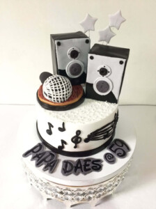 speakers, microphone, cake